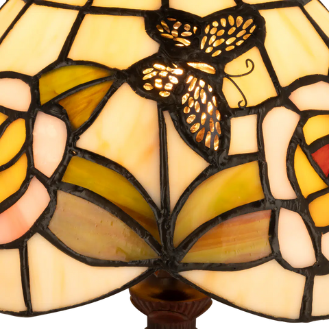 Detail Tiffany tafellamp bloemen en vlinders van glas in lood in crème-, geel- en groentinten