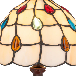 Detail Tiffany tafellamp ruitpatroon  van glas in lood in crèmetinten met gekleurde glasdruppels