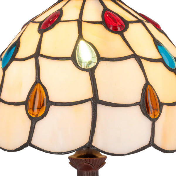 Detail Tiffany tafellamp ruitpatroon  van glas in lood in crèmetinten met gekleurde glasdruppels