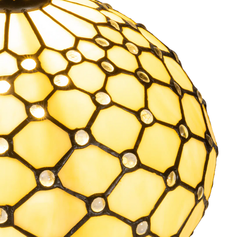 Detail Tiffany tafellamp ruitpatroon met verlichte voet met glasaccenten van glas in lood in crèmetinten