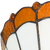 Detail Tiffany wandlamp klassiek rustig van glas in lood in wit-, amber- en bruintinten