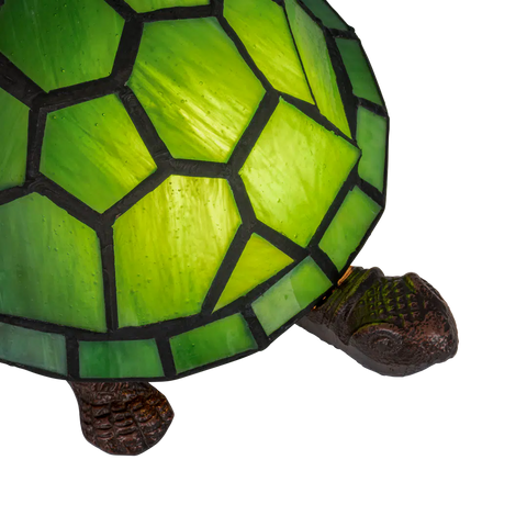 Detail Tiffany schildpadlamp met bronskleurige voet van glas in lood in groen glas-in-lood schild