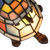 Detail Tiffany schildpadlamp met bronskleurige voet van glas in lood in multicolor glas-in-lood schild